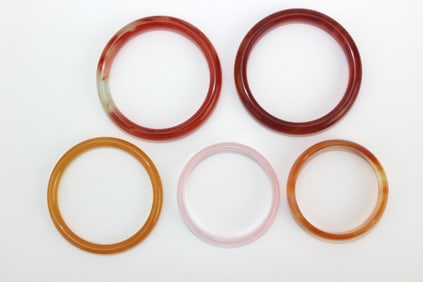 Group of Five Hard Stone Bangles