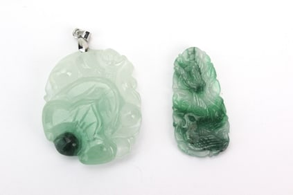 Two Carved Jadeite Pendants