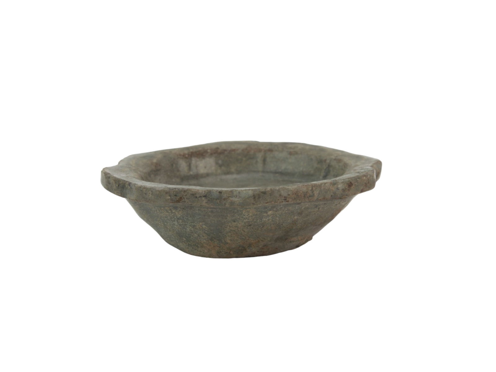 Antique Korean Celadon Foliate-Rimmed Bowl: Antique Korean celadon-glazed stoneware bowl with a foliate rim and soft greenish glaze. Shows natural weathering consistent with age. Approx. 3 3/4 in. (D) x 1 in. (H).