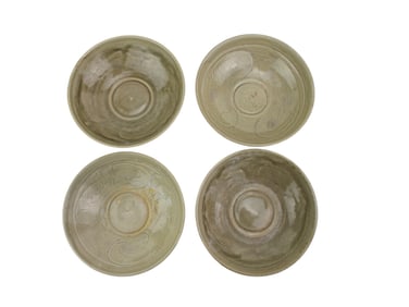 Four Carved Chinese Celadon Bowls