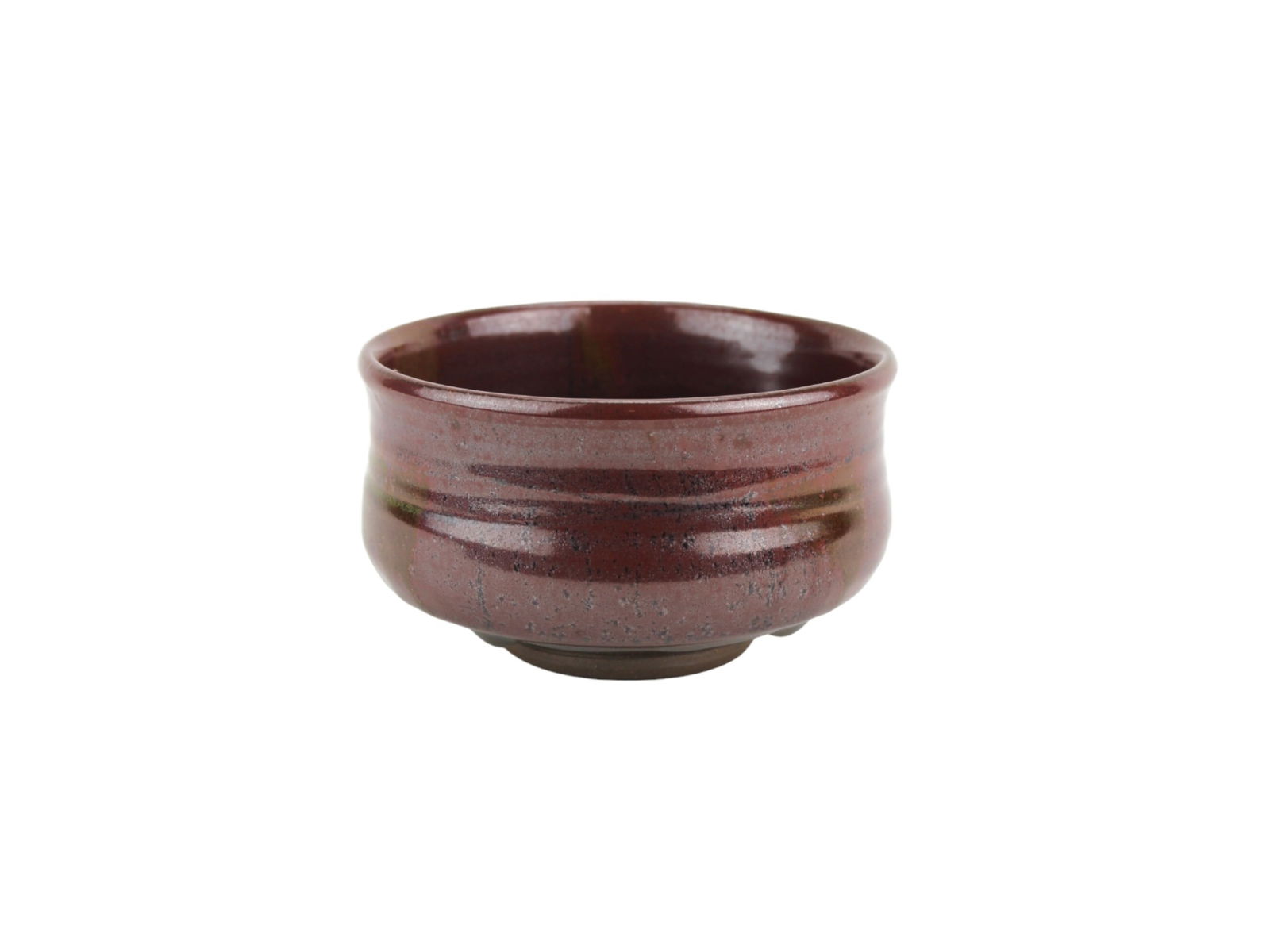 A CHINESE OXBLOOD GLAZE POTTERY BOWL: Vintage Chinese pottery bowl with deep oxblood glaze and subtle variegations. Rounded form with flared rim and ring foot. Natural glaze variations and minor age wear; no visible cracks or chips. Very