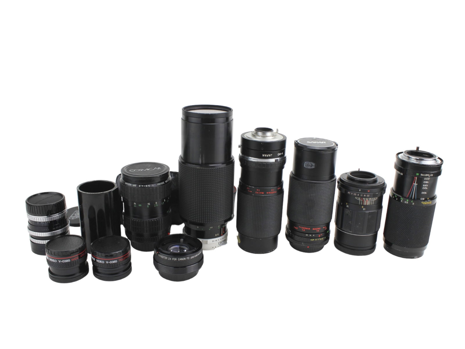 Eleven Various Photography Lenses: The Lot of Eleven Various Photographic LensesLENS. Includes: one rare P. Angenieus Paris F.35 1:2.5 Retrofocus Type R1 lens, one Ambico Videa V-0385 Wide-Angle 0.5 X lens, one Ambico Videa V-0385 Tele