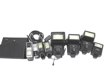 Eight Vivitar Camera Flashes