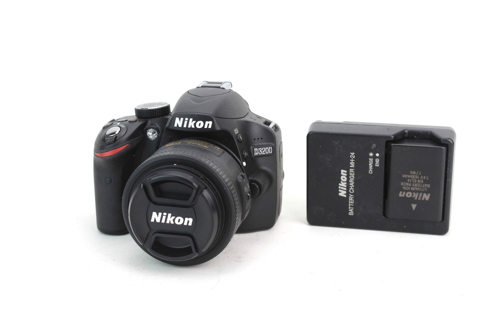 Nikon D3200 Megapixels Digital Camera: Nikon D3200 24 megapixels digital camera. Circa 2012. With an extra battery. In work condition,