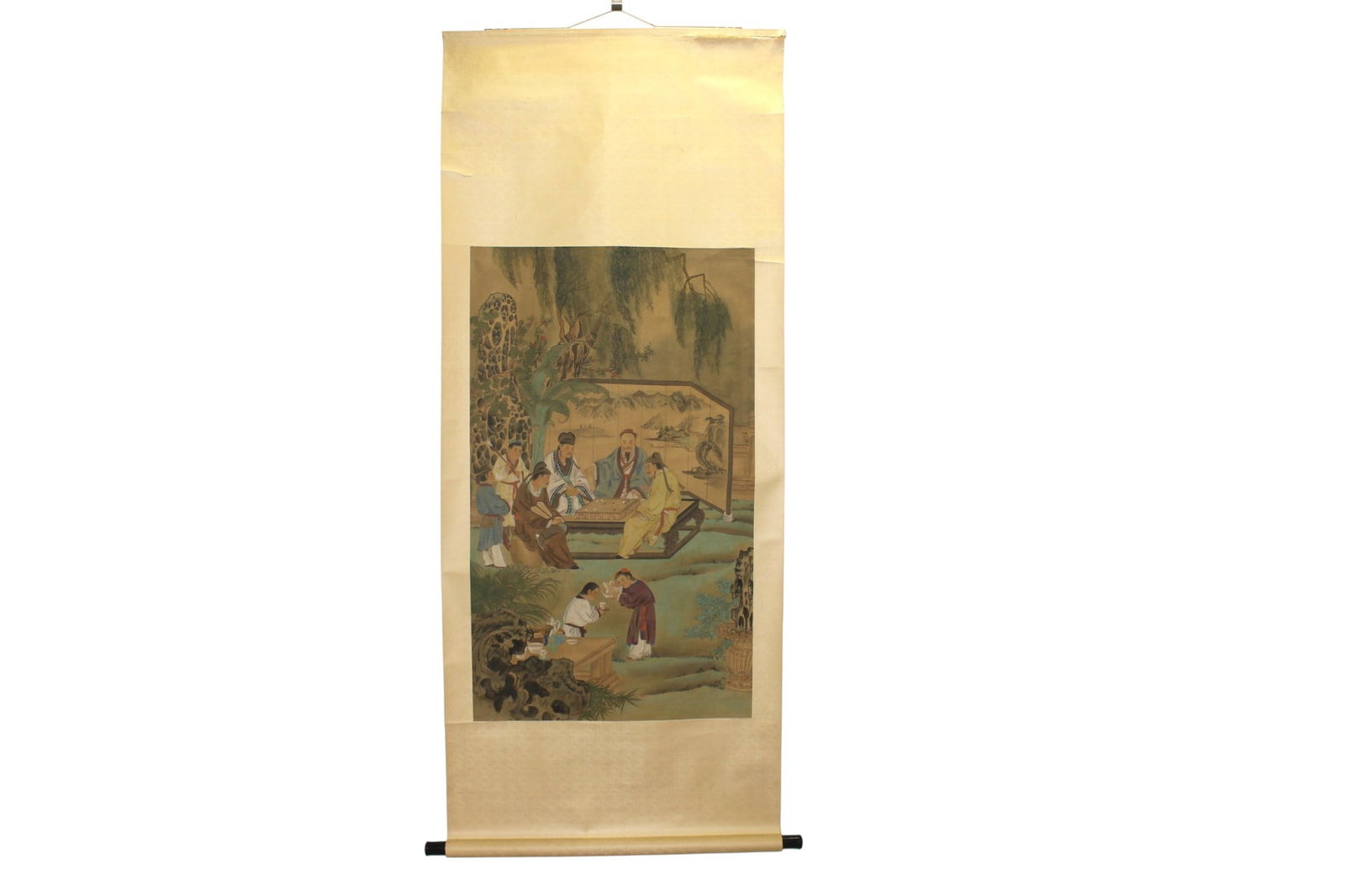 Chinese Scholar Scene Silk Scroll Painting: Chinese watercolor on silk depicting a scholar gathering in a garden. Painting: 25 X 41 1/2 in.; scroll: 30 X 73 in. Condition shows age-related toning, stains, foxing, creases, torn and mounting