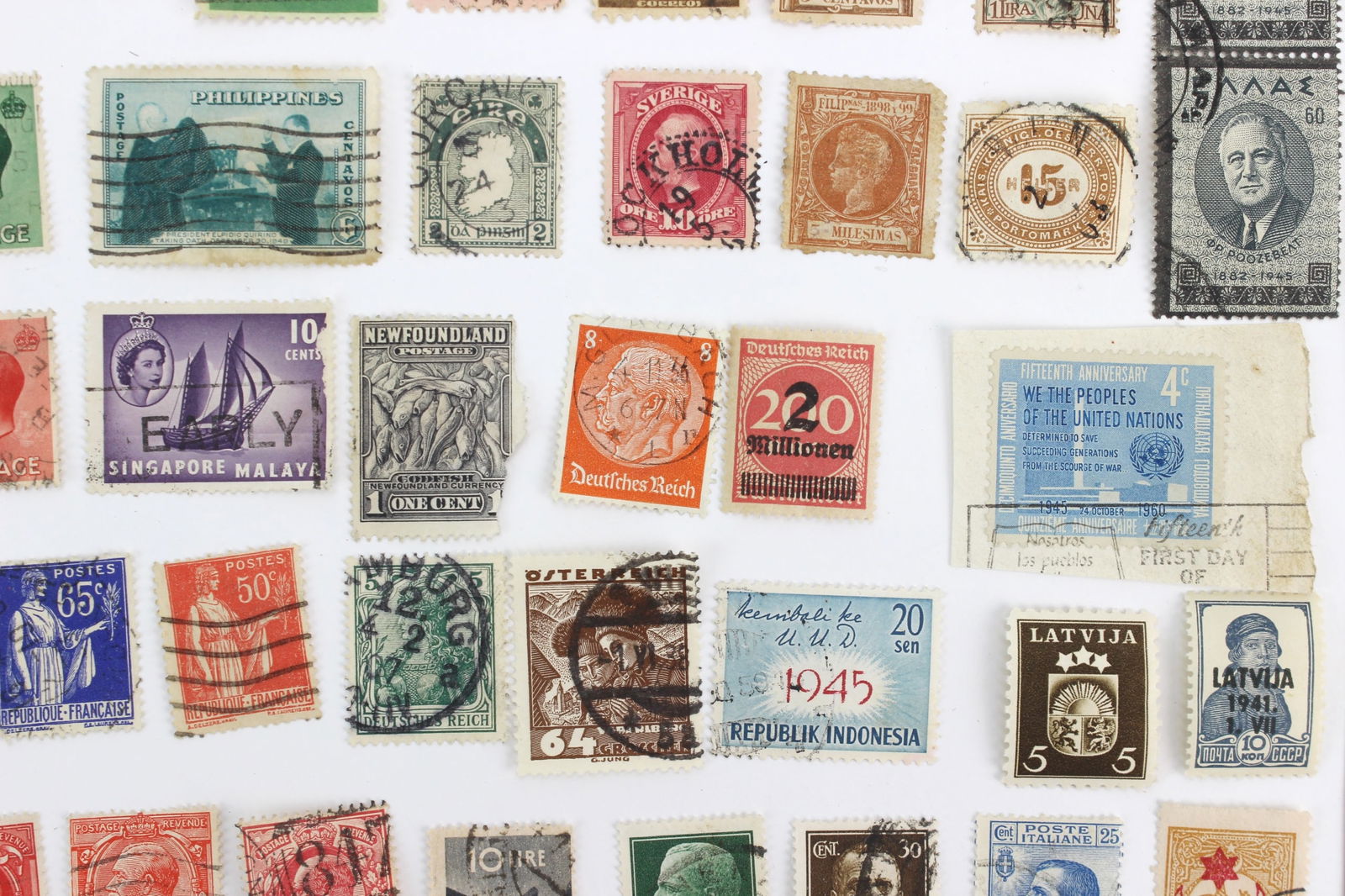 100+ Assorted International Postage Stamps - 5