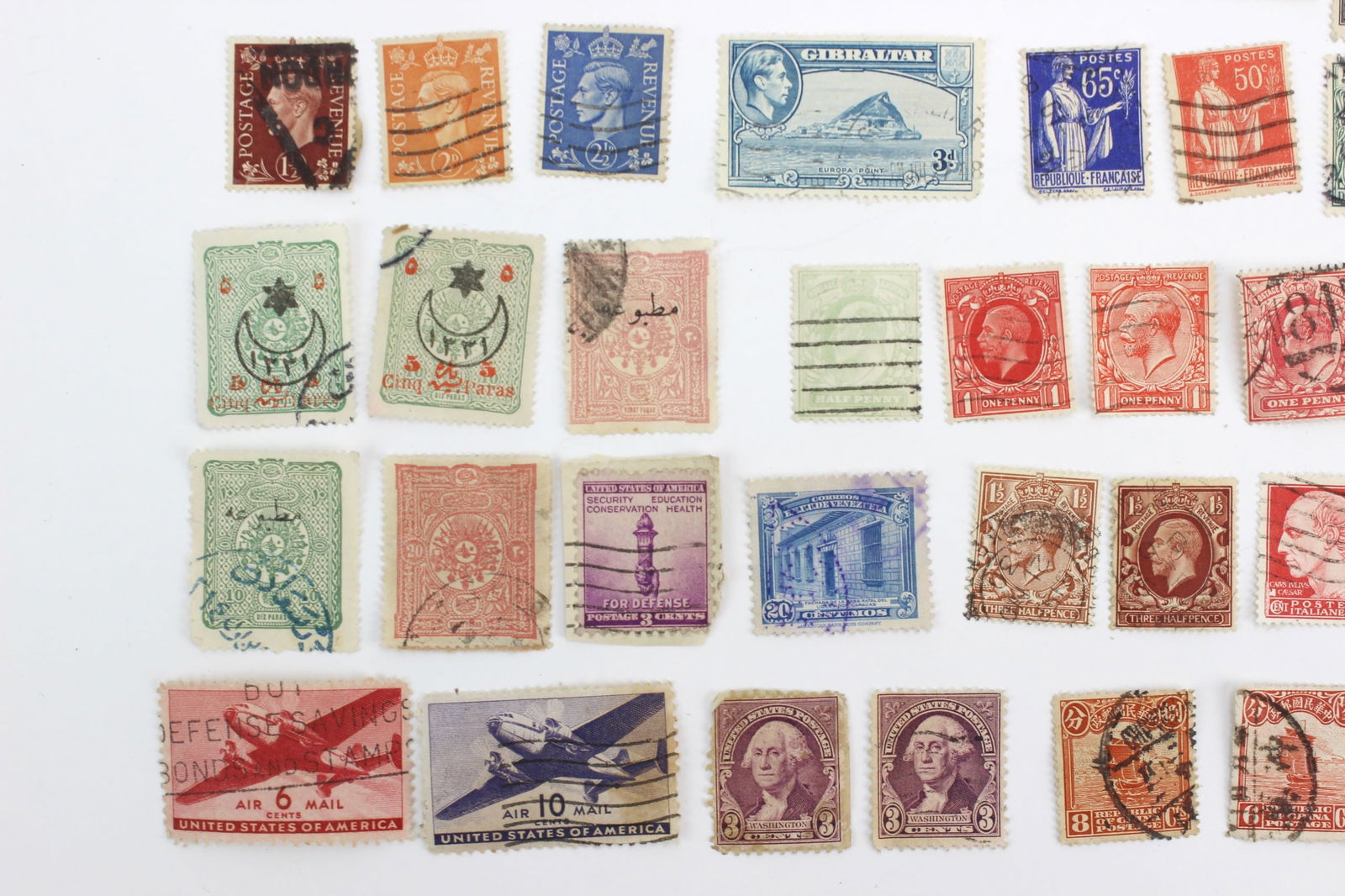 100+ Assorted International Postage Stamps - 6
