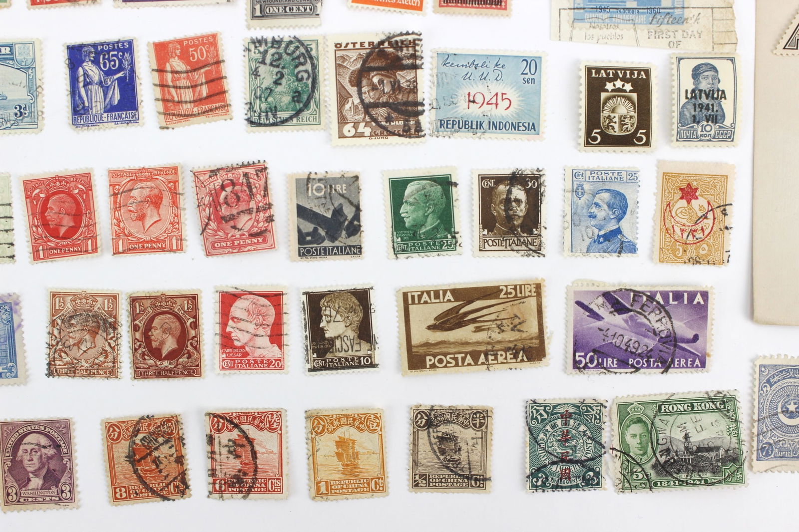 100+ Assorted International Postage Stamps - 7