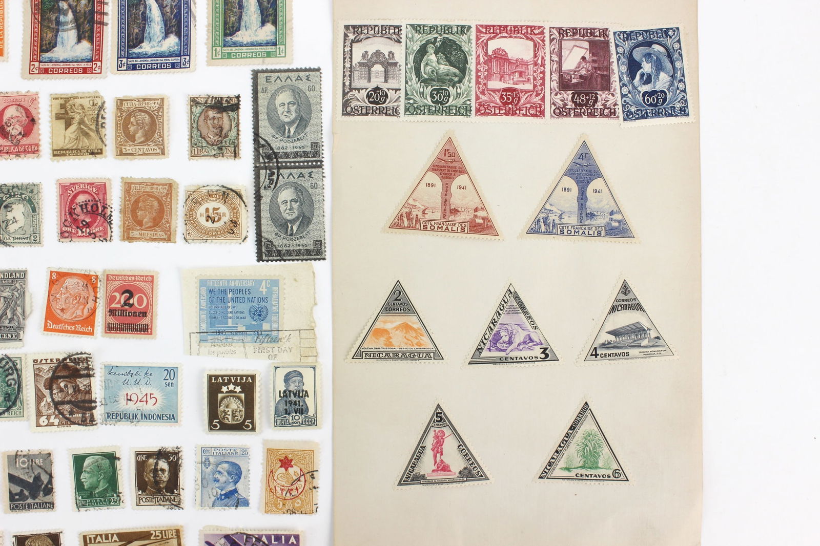 100+ Assorted International Postage Stamps - 8