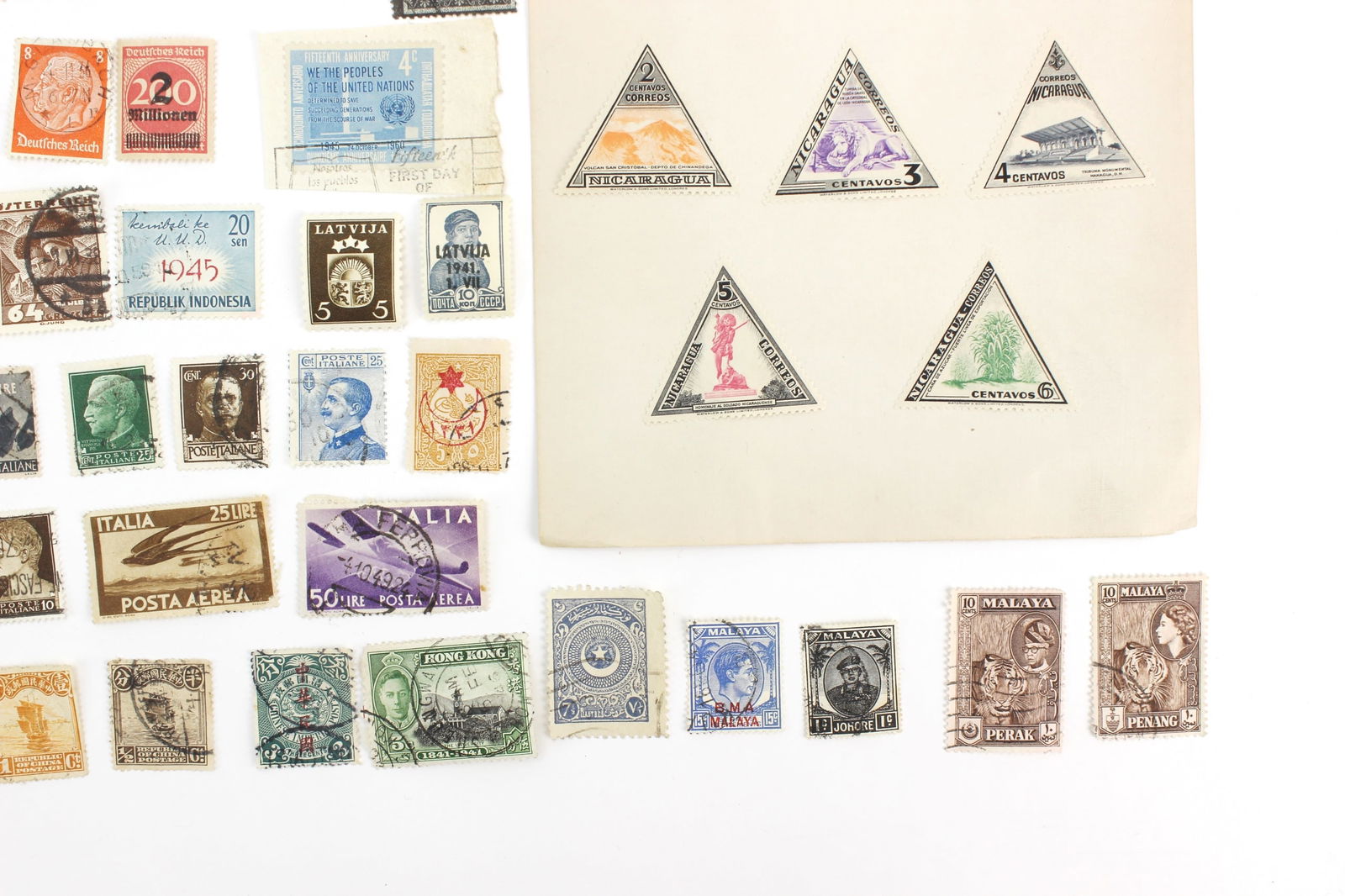 100+ Assorted International Postage Stamps - 9