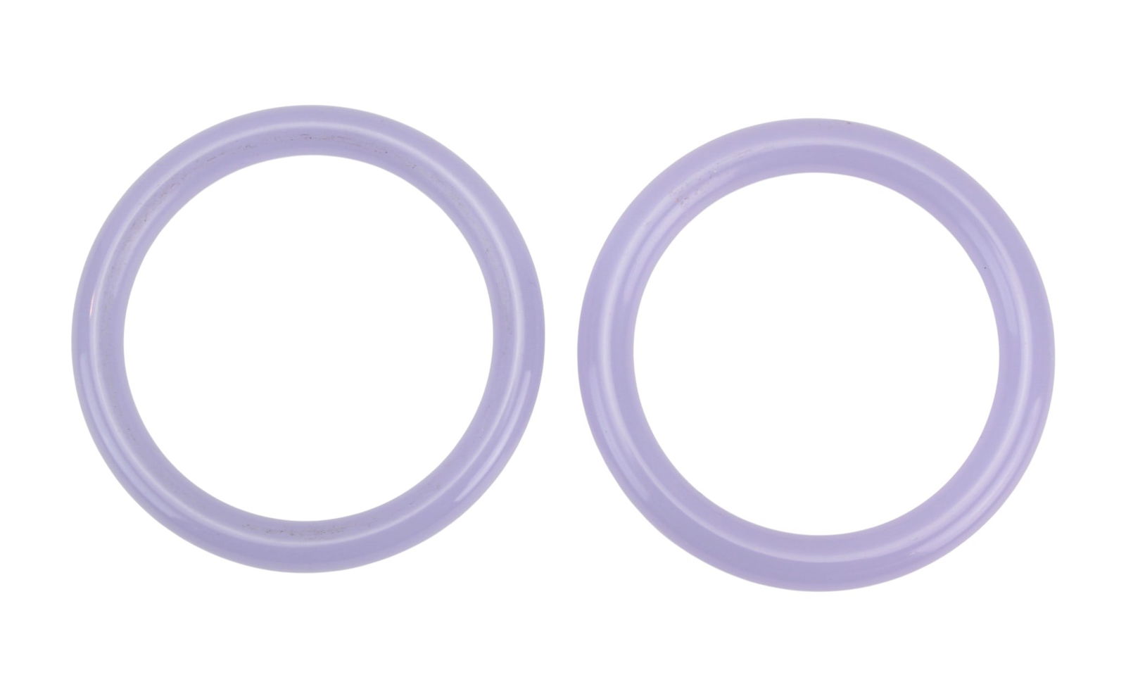 Two Lavender Hardstone Bangles: Pair Lavender Hardstone Bangles. Smoothly polished with soft lavender color. Approx. 72 mm outer and 55 mm inner diameter. Good condition with light surface wear and minor natural inclusions.