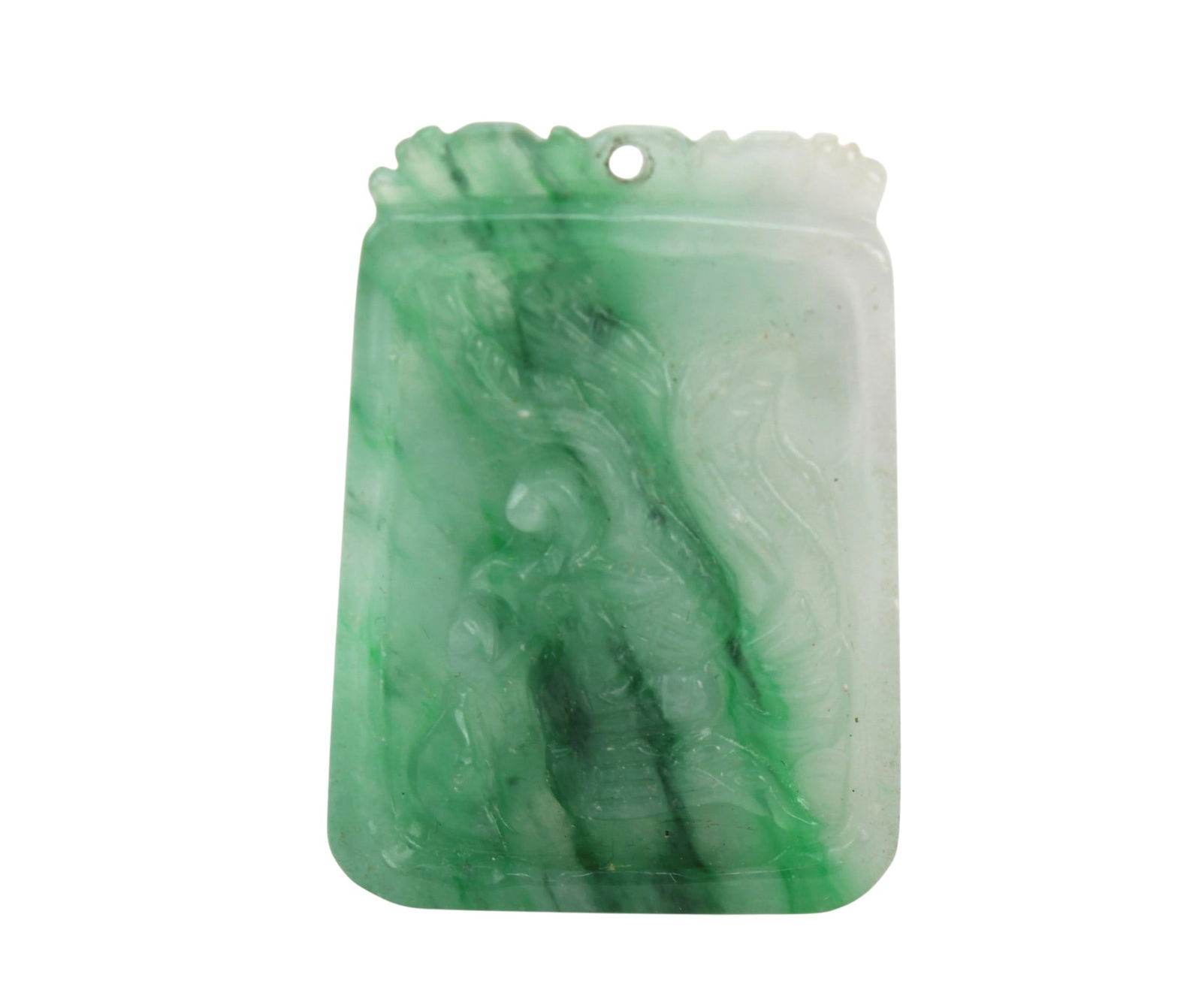Carved Green Jadeite Plaque Pendant: A carved jadeite plaque pendant in mottled green and pale tones, featuring relief decoration and a pierced top for suspension. Measures approx. 33.5 × 24.4 mm. Condition is good overall, with light