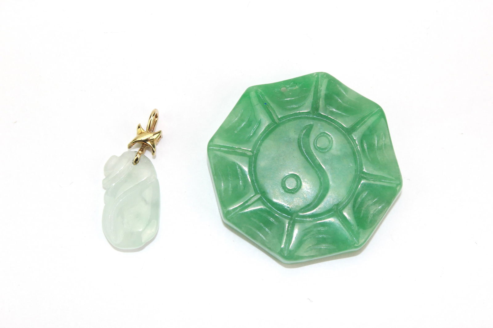 Two Carved Jadeite Pendants (1 of 6)