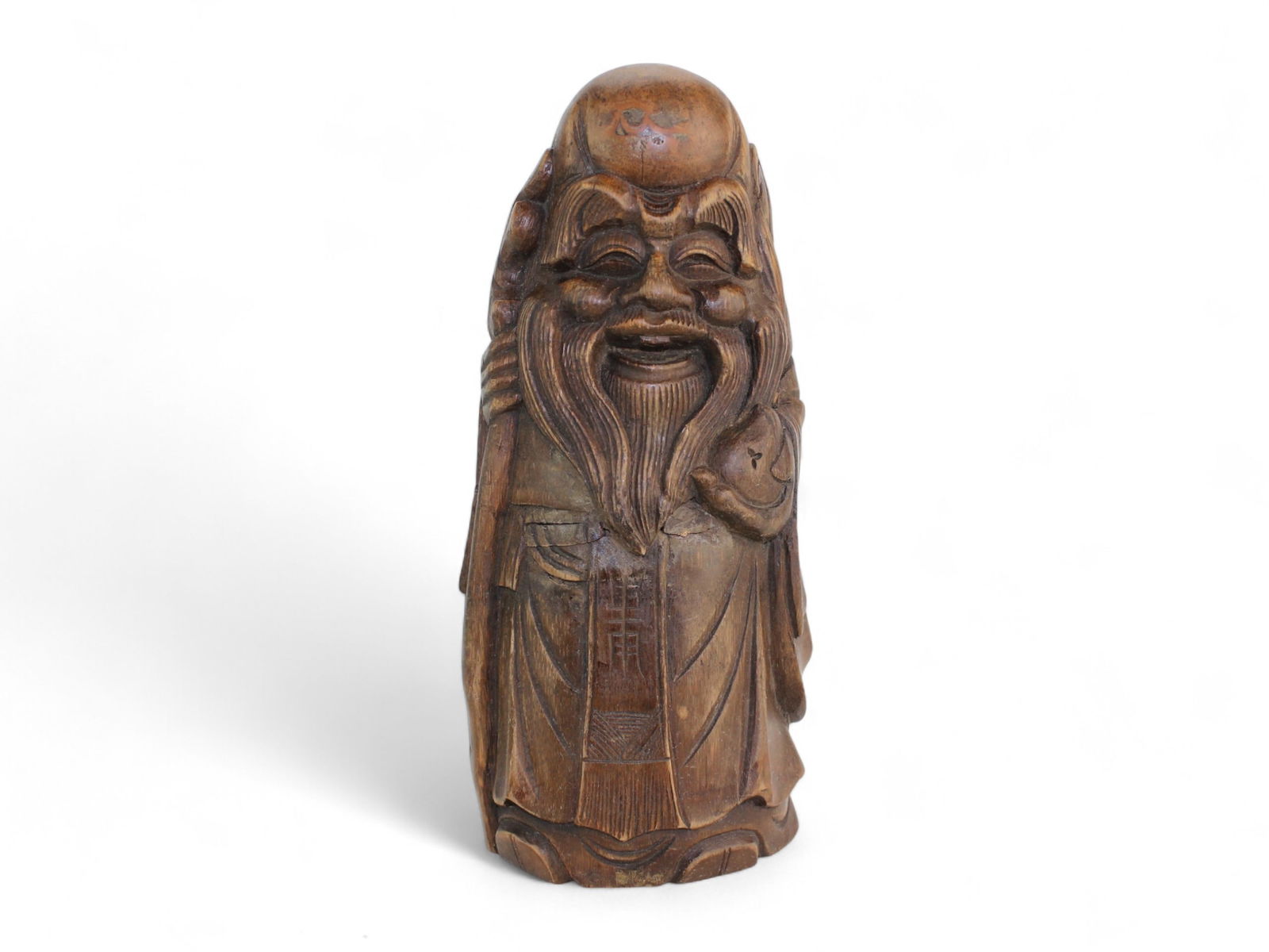 Antique Chinese Bamboo Carving of Shou Lao: A Chinese bamboo carving of Shou Lao, featuring intricate detailing and traditional symbols of longevity. It measures approximately 10 1/4 in. (H) X 4 1/4 in. (L) X 3 1/2 in. (W).