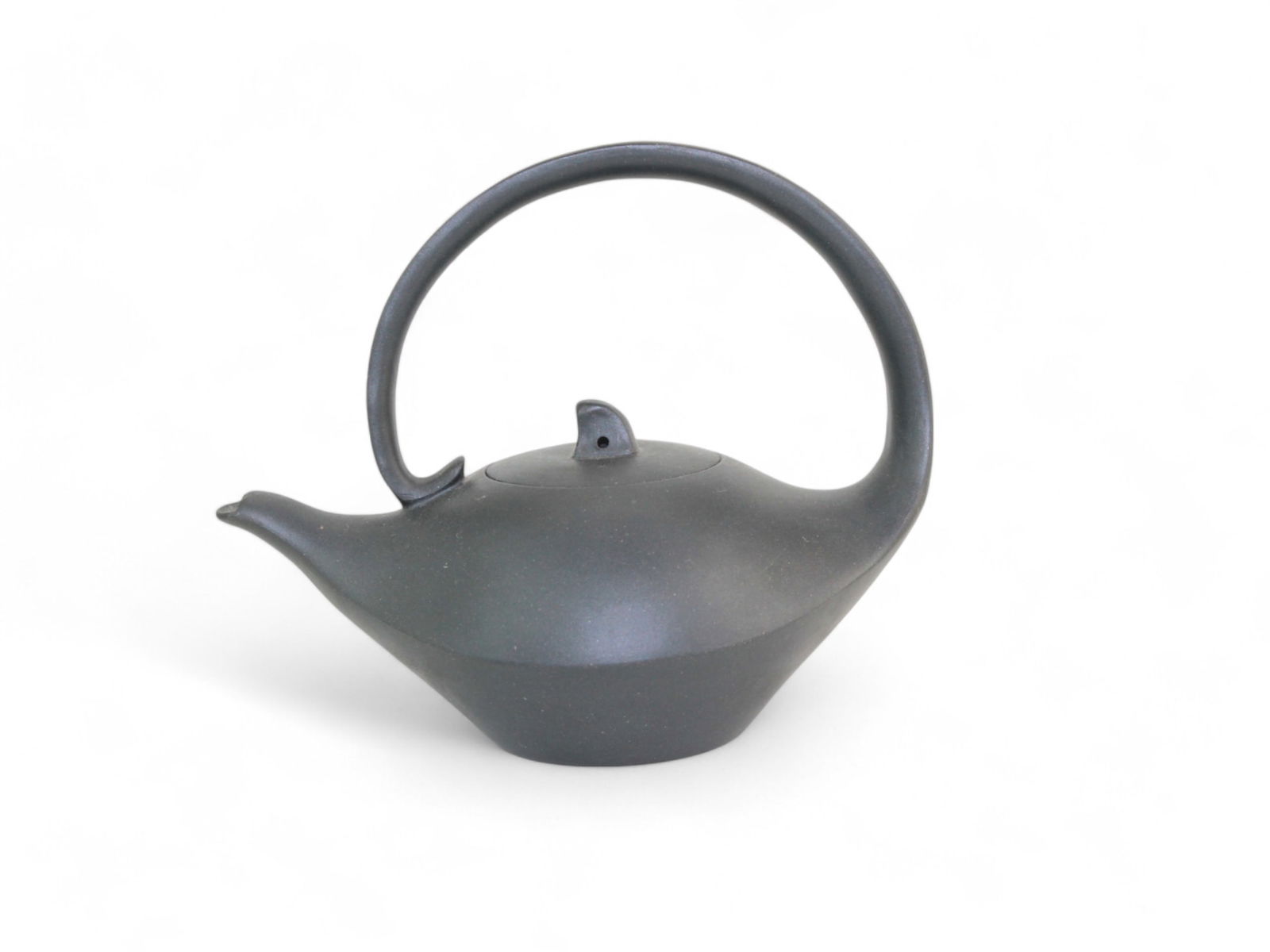 A Chinese Yixing Zisha Teapot - zhou Yin-Xin: Dimensions: 4 1/2 X 3 1/2 X 5 1/4 in.. Volume: 180 cc. Signed Zhou Yin-Xin.