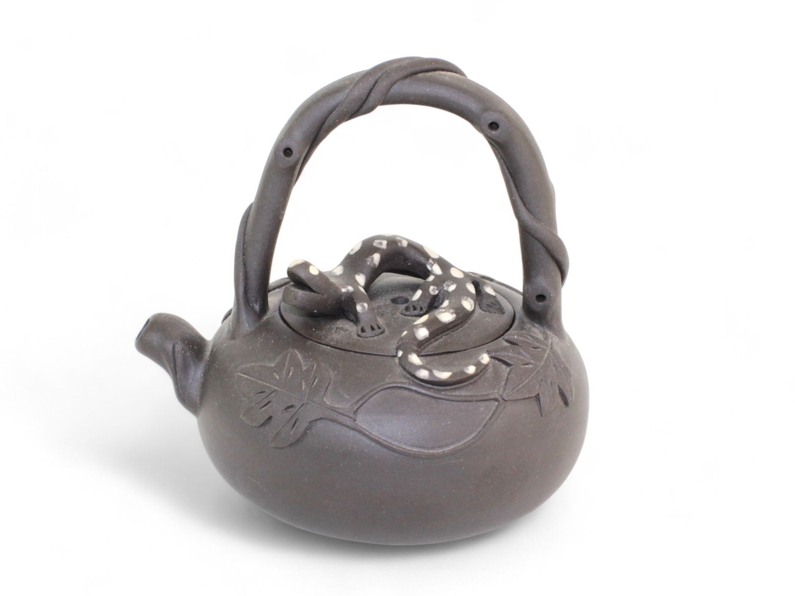 A Chinese Yixing Zisha Teapot - Yin Su-Ying: Dimensions: 4 1/2 X 4 1/2 X 4 in.. Volume: 220 cc. Signed Yin Su-Ying.