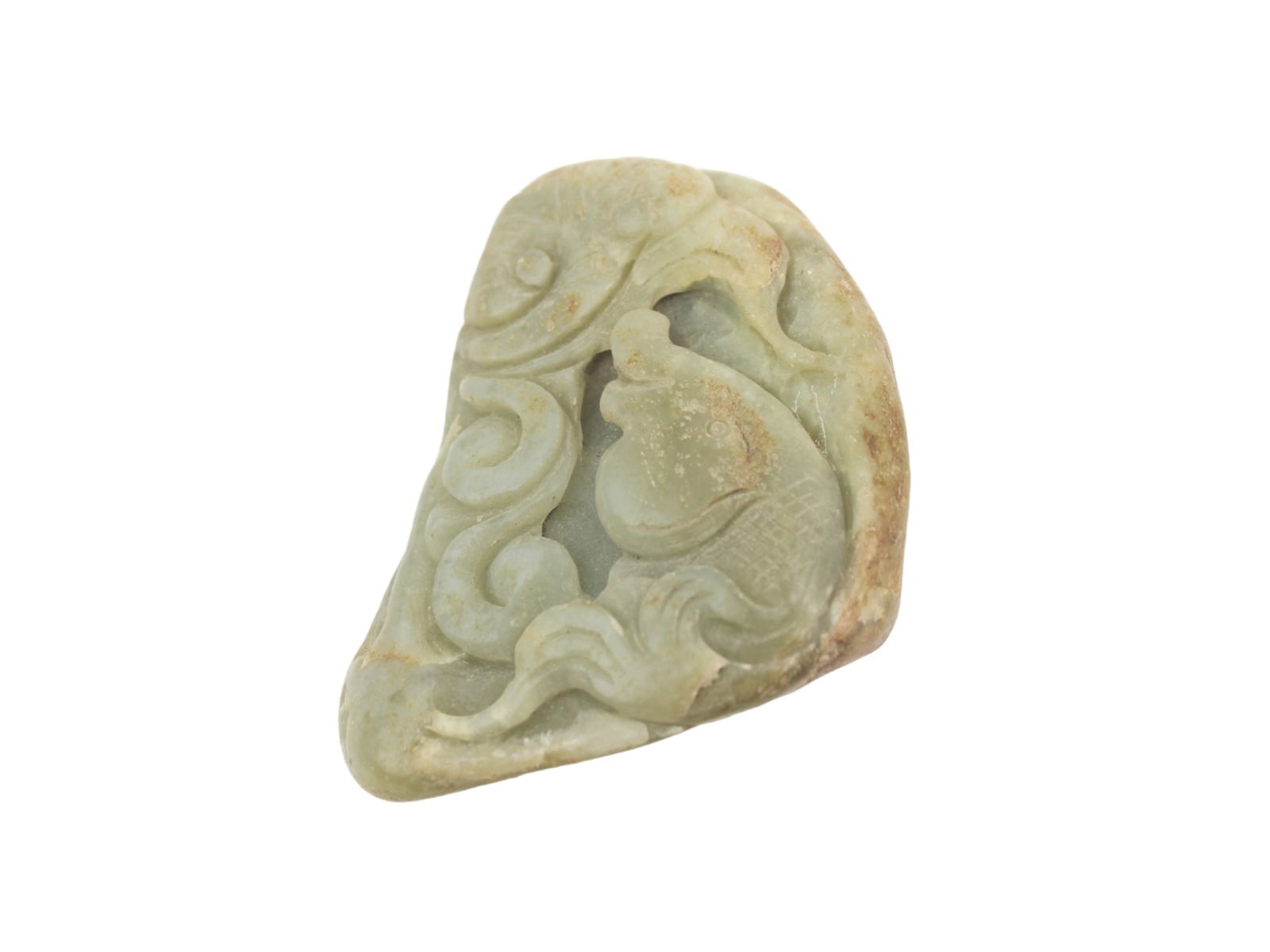 Chinese Jade Carving with Fish/Lotus Motif: A Chinese Gray Jade carving depicting a fish and lotus design, symbolizing abundance and harmony. It features natural russet inclusions and intricate detailing. It measures approximately 3 X 2 1/2 X