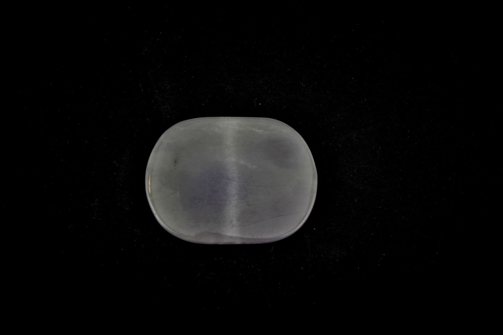 Translucent Lavender Jadeite Pendant: Oval jadeite pendant with soft lavender tone and polished finish, featuring a horizontal drill hole for stringing. It measures approximately 4 cm (L) X 3 cm (W).