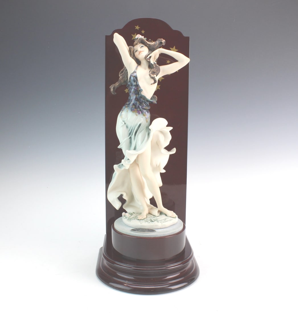 Giuseppe Armani “Dawn?? Figurine w/ Stand: Giuseppe Armani Florence limited-edition figurine titled “Dawn – The Coming of the New Millennium.” Hand-painted porcelain depicting a flowing female dancer, signed and numbered 1029/5000.