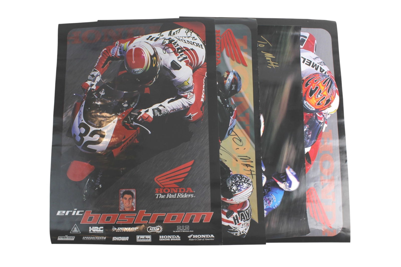 Four Signed Honda Motorcycle Racing Posters: Group of three signed motorcycle racing posters, each measuring 19 × 26 in., featuring Honda racing imagery and riders. All posters are hand-signed in marker. Signatures Include Eric Bostrom, Hurtis