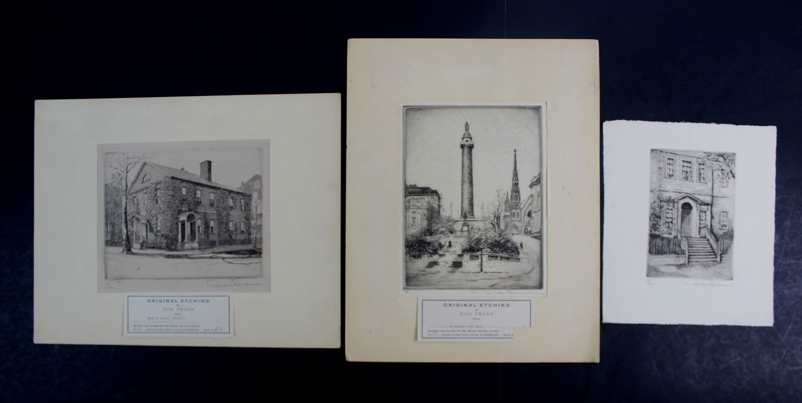 Three Don Swann Etchings–Monument, House, Doorway: Group of three original etchings by Don Swann, including “Monument and Snow,” “Myer’s House, Norfolk,” and “Chase House Doorway, Annapolis.” Each piece is hand-signed and