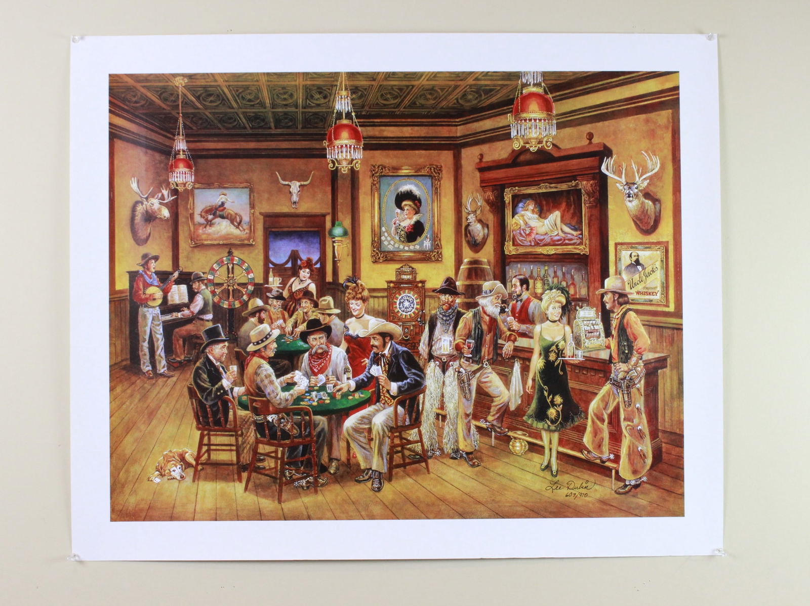 Lee Dubin, Western Saloon, Signed Lithograph: Signed lithograph by Lee Dubin depicting a lively Old West saloon scene with cowboys, gamblers, musicians, and bar patrons. Numbered 607/910. The image in the size of 23 in. (W) X 30 in. (L); and