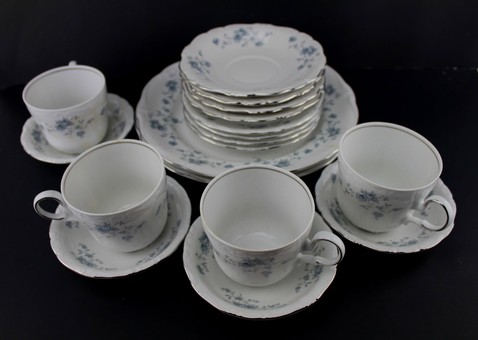 18 PCs Germany Bavaria Dinner Set: Germany Johann Haviland Bavaria porcelain dinner wares. Includes 4 coffee cup sets (saucer measures 5 in. D., cup measures 3 in. H.); 8 saucers (6 1/4 in. D); 2 dishes (10 in. D).