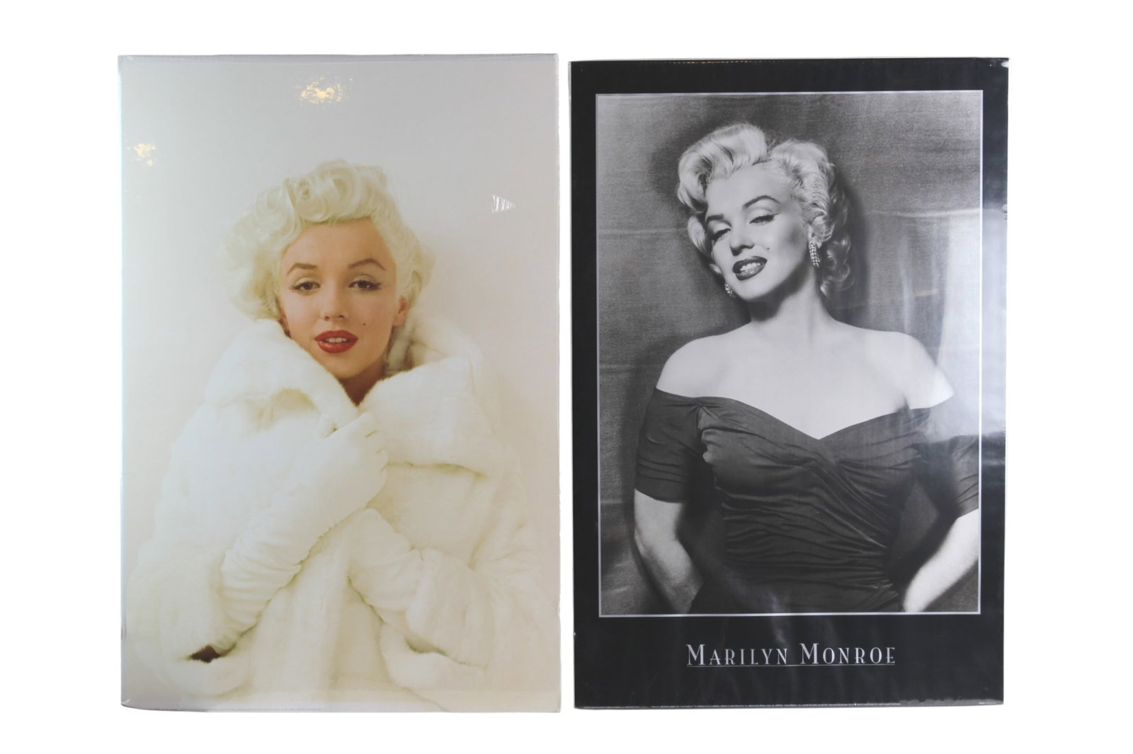 Two Marilyn Monroe Portrait Posters: Pair of Marilyn Monroe portrait posters, each approx. 24 X 36 in. Overall good condition with light surface wear, minor scratches, edge wear, and slight paper waviness; no major tears.