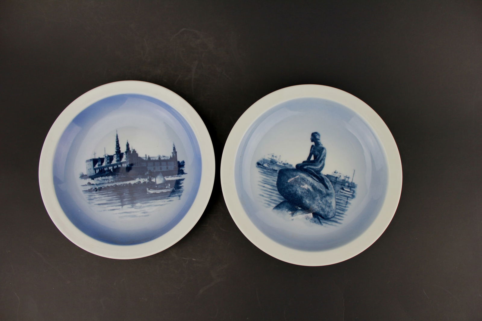 Two Royal Copenhagen Plates: Serial No. 2985-11 and 2985-13. Dimensions: 6 1/2 in. in Diam. Age wear.