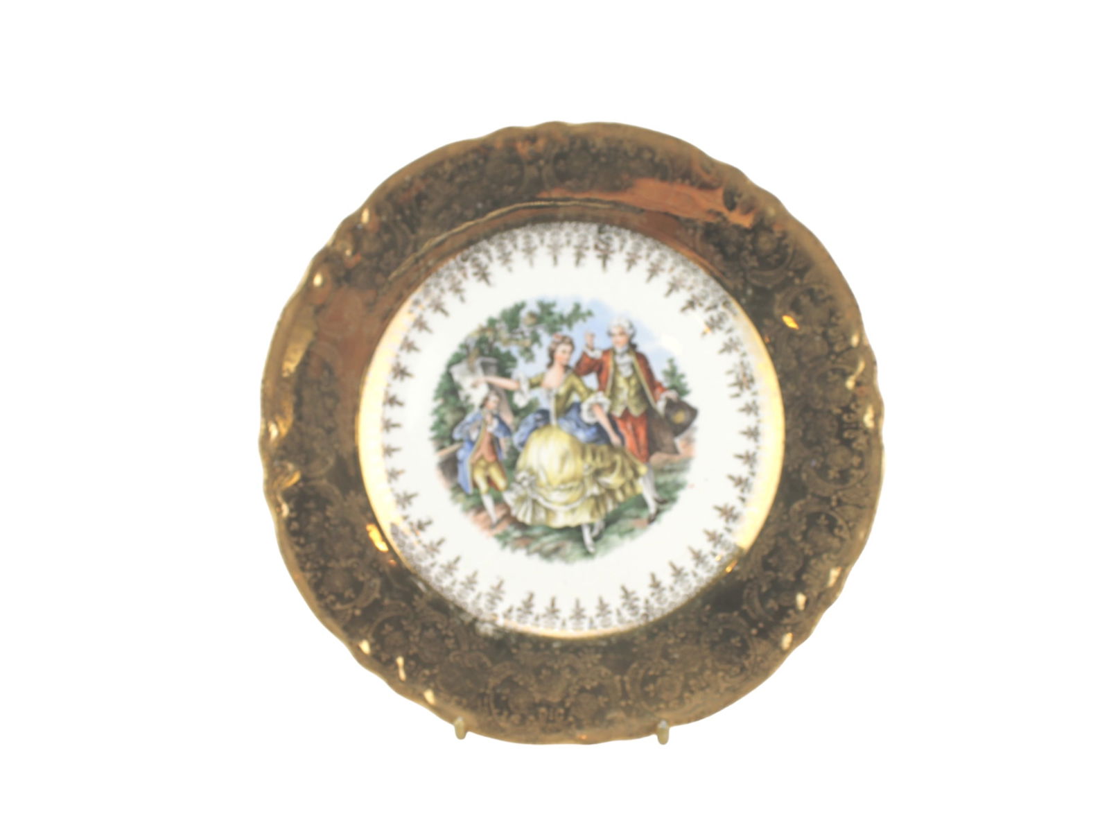 HK China Decorative Plate with 22K Gold Trim: Decorative porcelain plate featuring an 18th-century courtship scene at the center and a richly detailed 22K gold filigree border. Marked "Warranted H.K. China 22 Karat Gold" on the back. It measures