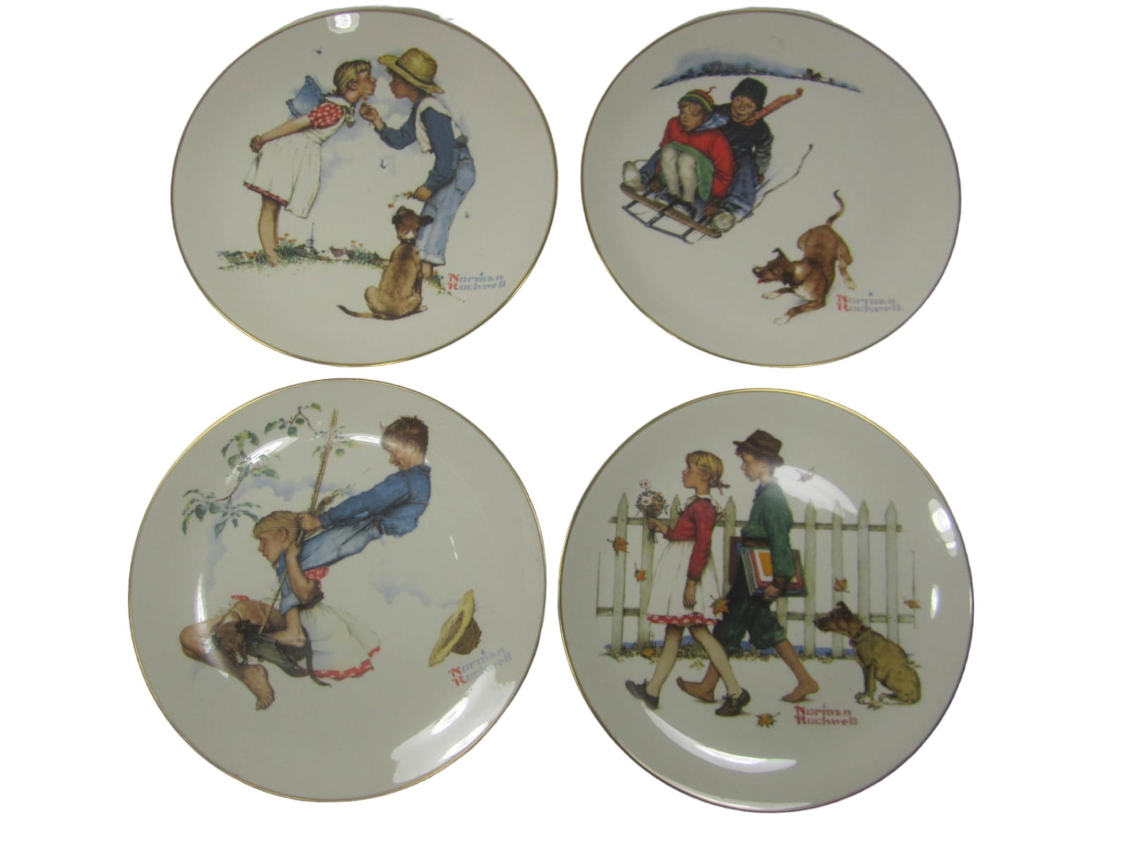 Norman Rockwell Four Seasons Plates, 1972: NORMAN ROCKWELL FOUR SEASONS PLATES, 1972 LIMITED IN EDITION. Including: Spring-Beguiling Buttercup; Summer-Flying High; Fall-A Scholarly Pace; Winter-Downhill Daring. In original package. The plates