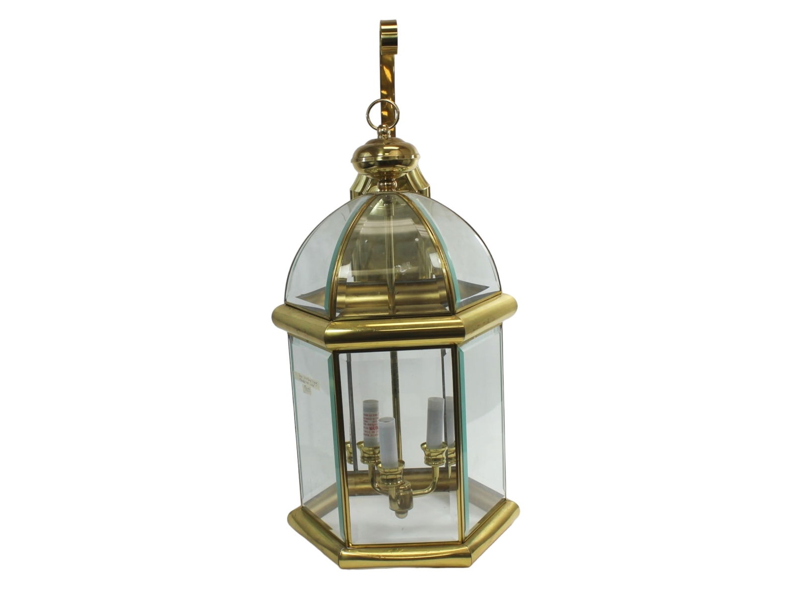 Quoizel Solid Brass Four-Light Wall Lantern: Elegant wall-mounted Quoizel lantern crafted from solid brass with beveled glass panels in a hexagonal frame topped by a domed canopy. Features a classic four-light candelabra interior and retains ori