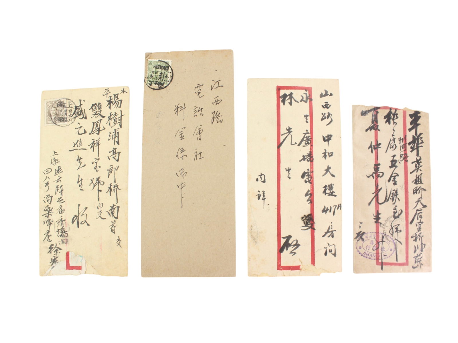 Group of 4 Republican-Era Chinese Mail Covers: Collection of four vintage Chinese mail covers from the early Republic era, each with handwritten addresses, traditional calligraphy, and original postal stamps from Shanghai and other regional