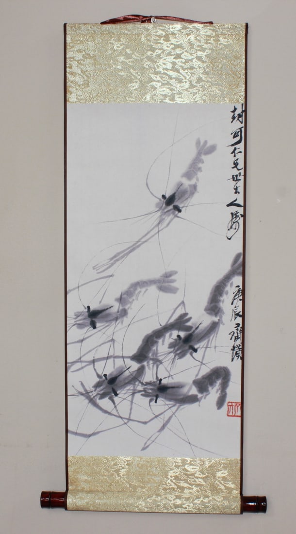 Chinese watercolor Print Scroll of Shrimp: Traditional Chinese watercolor print scroll depicting a lively school of shrimp in expressive brushwork, mounted with gold brocade borders. Minor edge wear, overall in good condition. Image approx.