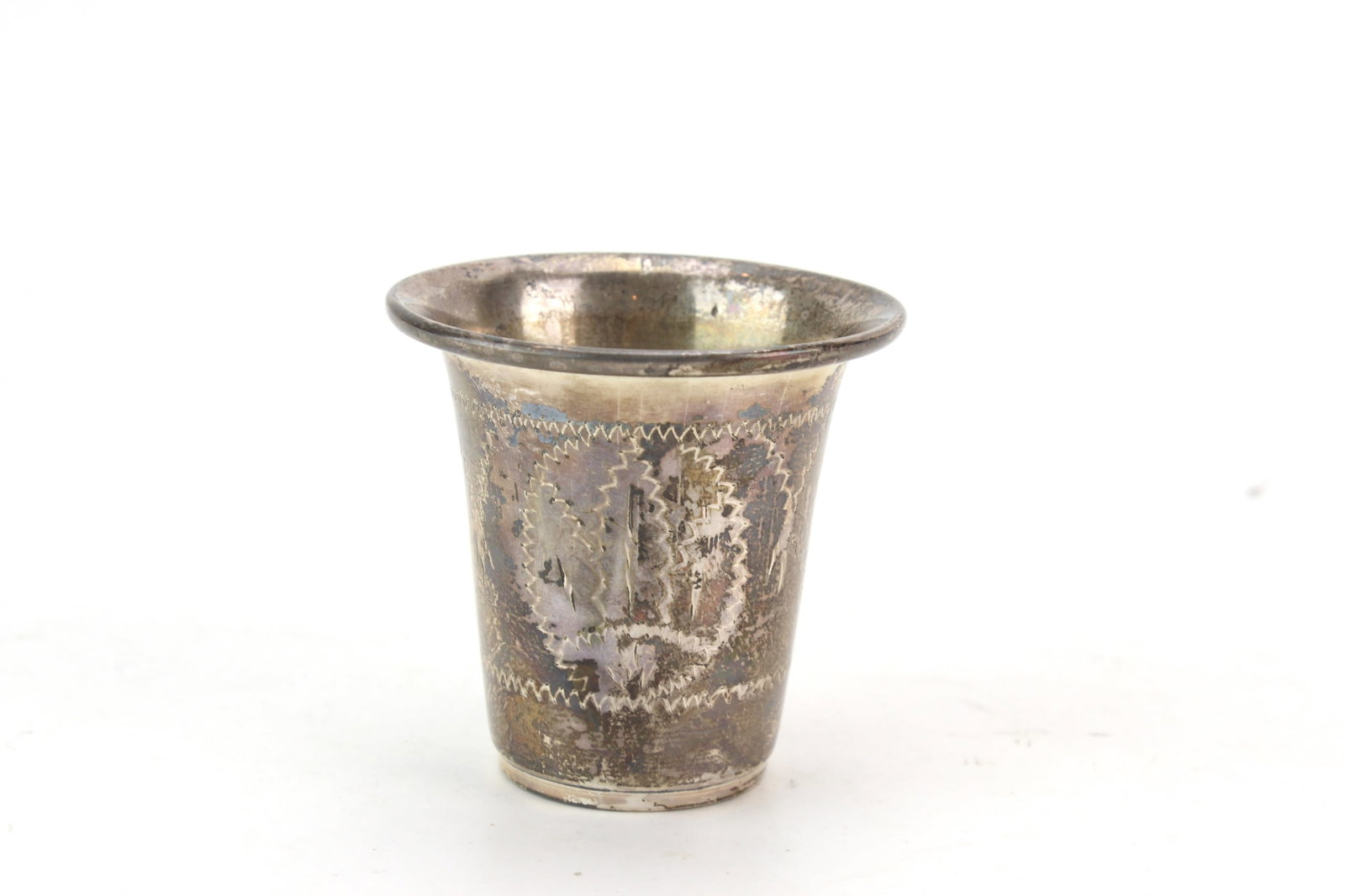 Sterling Silver Engraved Cup: Small sterling silver cup with engraved foliate decoration and flared rim. Marked "STERLING" on the base. Measures approximately 2 in. (H) ? 2 in. (D) and weighs 45 grams. Condition: good overall