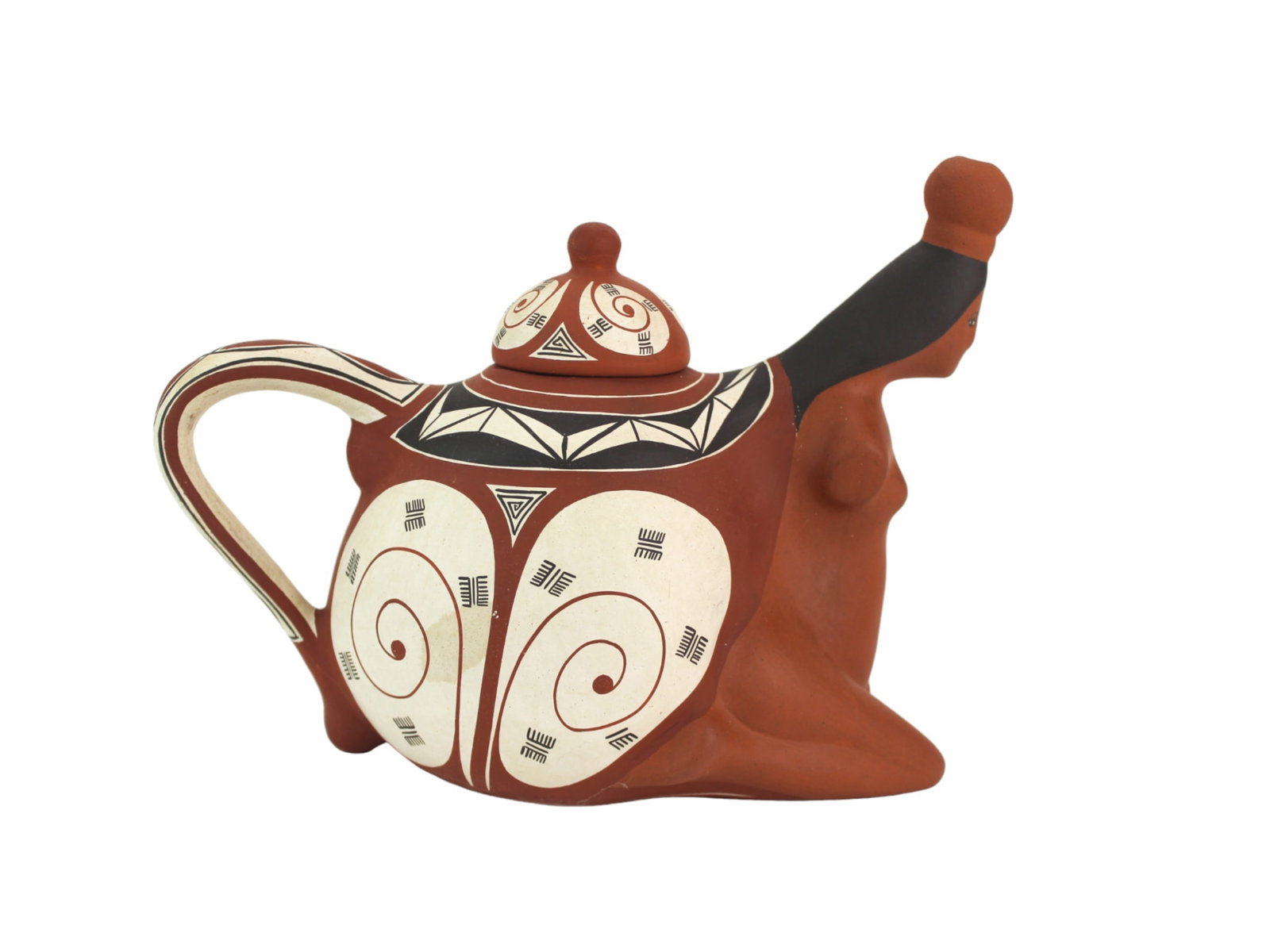 Handcrafted Figural Pottery Teapot: A striking handcrafted pottery teapot featuring a stylized kneeling woman motif with intricate hand-painted geometric and spiral designs in natural red, white, and black pigments. Approx. 8 x 10 x 6