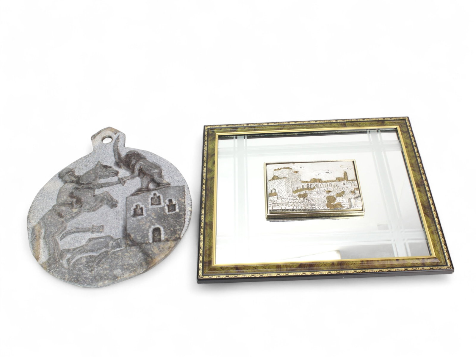 Framed Jerusalem Mirror & Soapstone Wall Hanging: Pair of decorative collectibles: a framed Italian ?Mirror of Jerusalem? plaque (11 in. x 13 in.) with light edge wear, and a carved soapstone wall hanging depicting a knight in battle (11 in. x 9 1/2