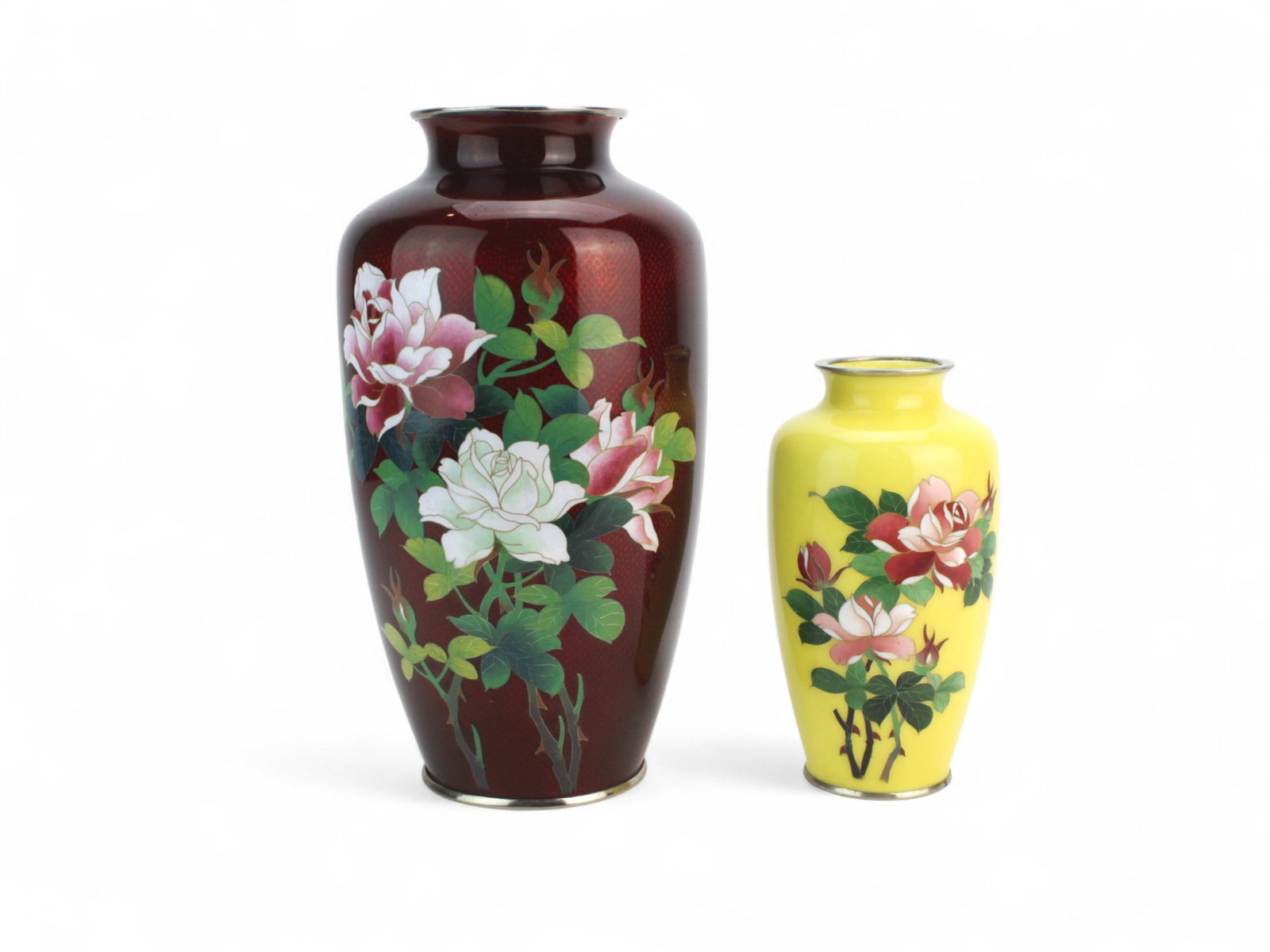 Two Cloisonne Enamel Vases with Floral Design: Pair of cloisonne enamel vases: one deep red with peony designs, the other bright yellow with floral motifs, the smaller marked ?SUZUKI? on base. Both in very good condition with light wear. Red