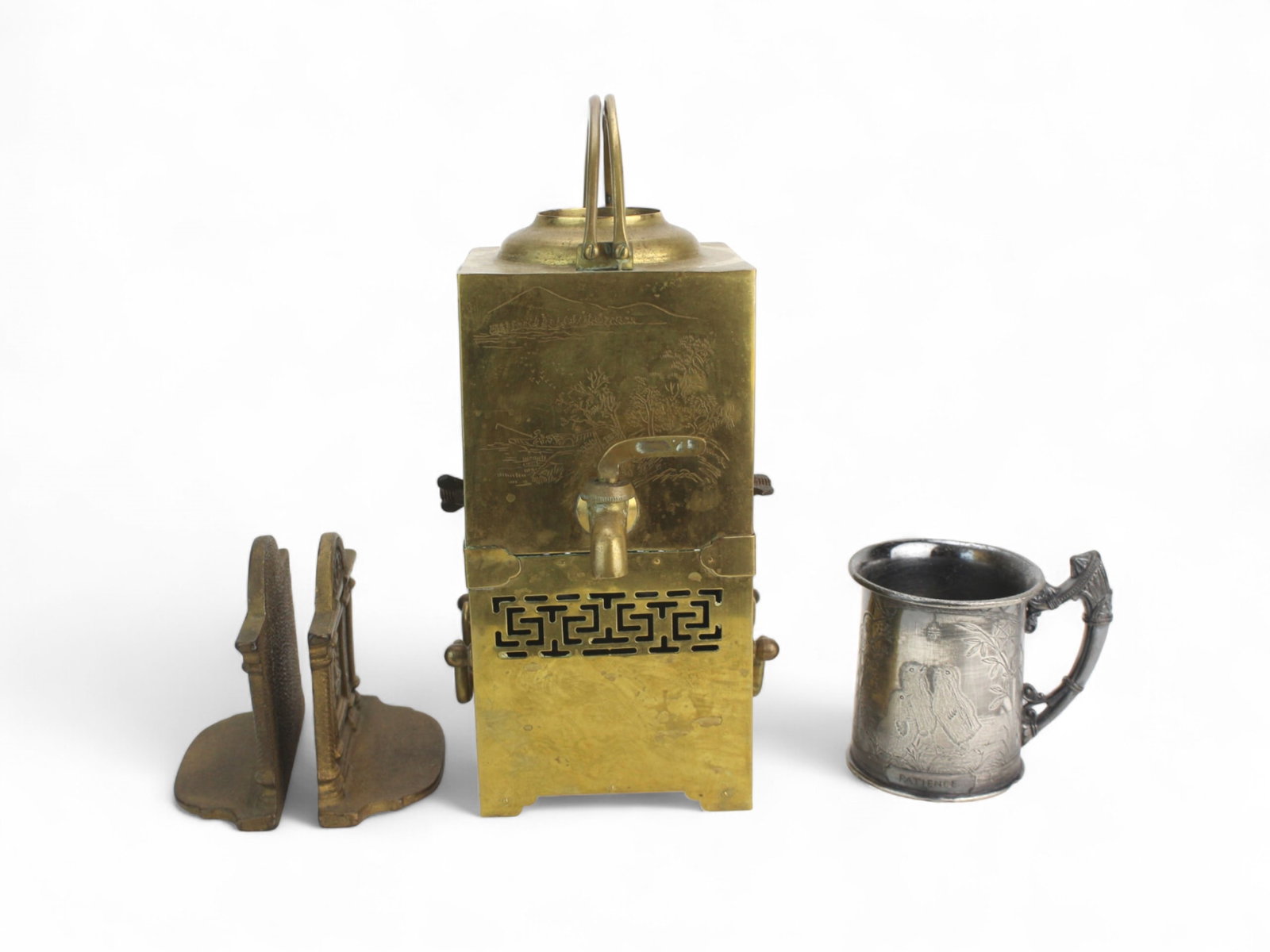 Group of Antique Metal Decorative Items: Mixed group including a Chinese bronze square teapot with engraved scenic motifs (9 in. H), a pair of bronze bookends with classical reliefs (4 in. H), and a silverplate mug by James W. Tufts inscribe