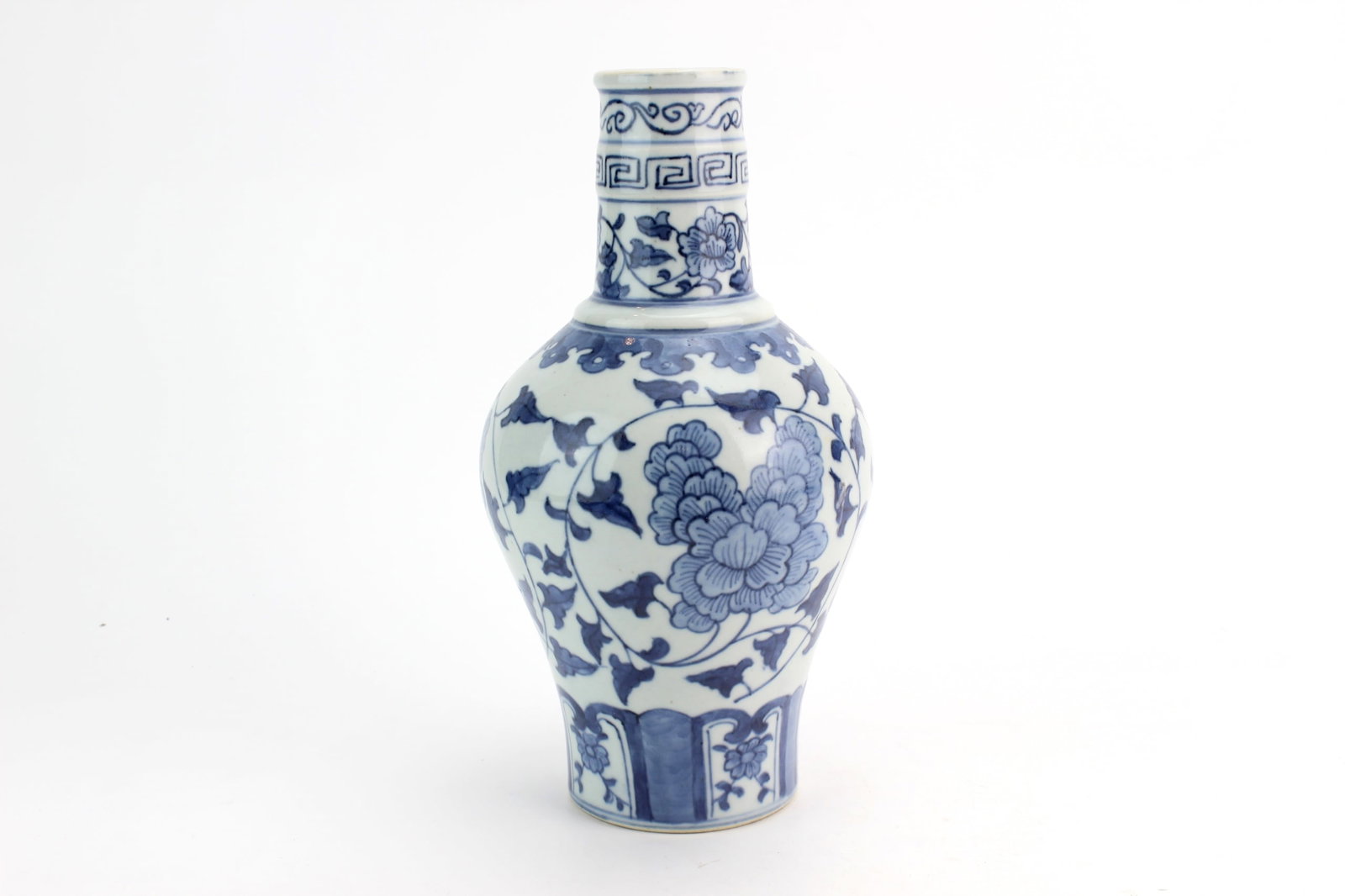Chinese Blue & White Porcelain Vase: Chinese blue and white porcelain vase decorated with floral scroll motifs and geometric borders, bearing apocryphal six-character Ming style mark to base. Measures approximately 9 1/2 in. (H) X 5 1/2 