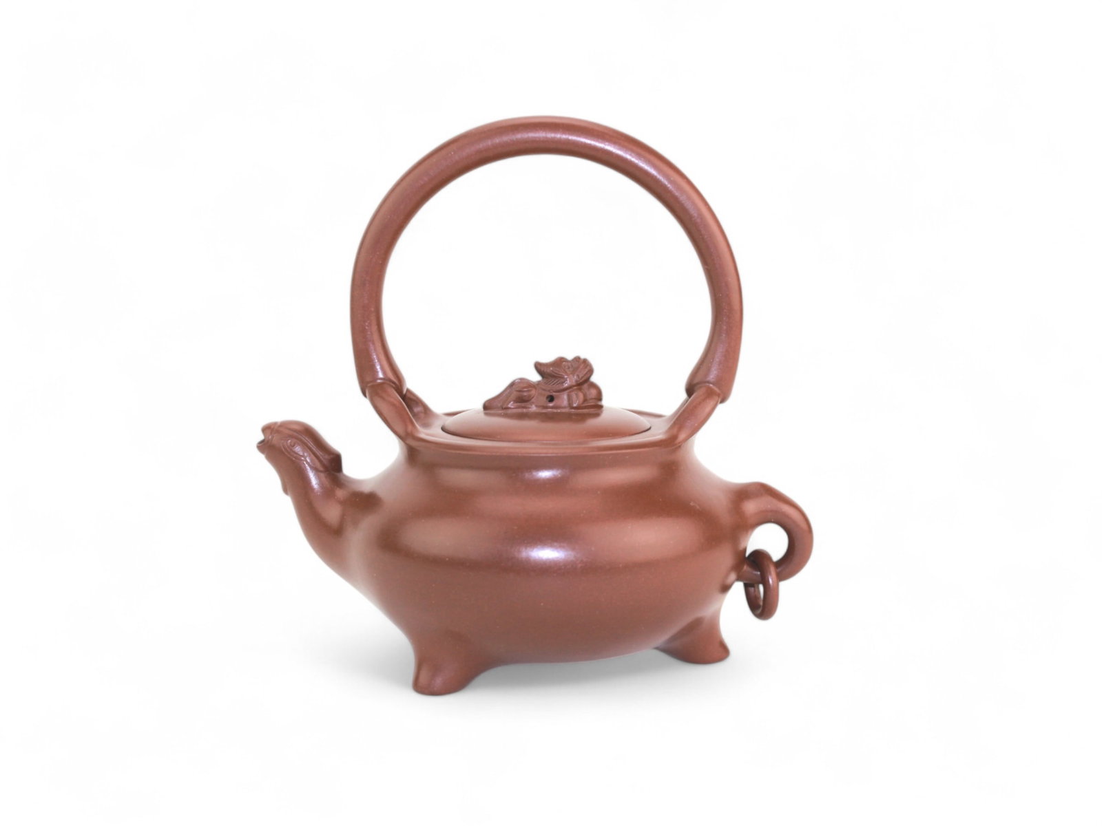 Chinese Zisha Clay Teapot with Dragon Spout: Finely crafted Chinese Zisha teapot featuring a sculpted dragon-form spout and a detailed lion finial on the lid. The reddish-brown Yixing clay body stands on three legs with an arched handle and a