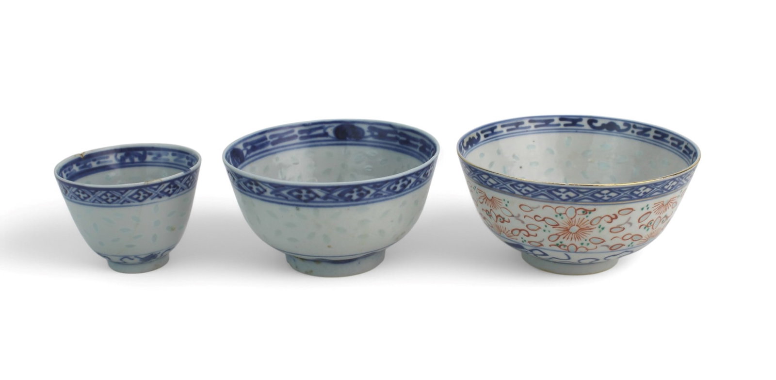 Group of Three Chinese Rice Grain Porcelain Bowls: Set of three Chinese rice grain bowls, two blue and white and one polychrome with gilt rim; smallest cup has rim chips and a hairline. Largest measures 4 1/2 in. (D) x 2 1/4 in. (H); smallest teacup