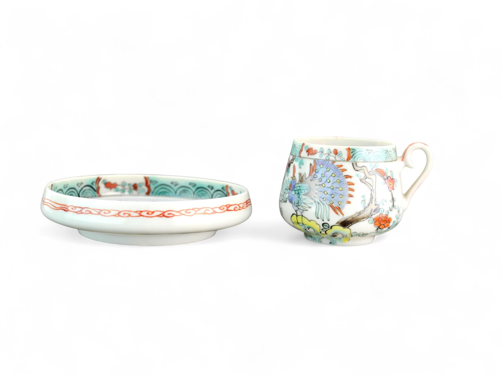 An Japan Tashirozo Egg-Shell Porcelain Tea Set: One Hand-Painted Tashirozo Egg-shell teaset, Early 20th Century, The dimensions of teacup is Approx. 3 3/4 in. (H) X 2 1/4 in. (L) X 2 in. (W), and the saucer is about 4 in. (D) X 1 in. (H).