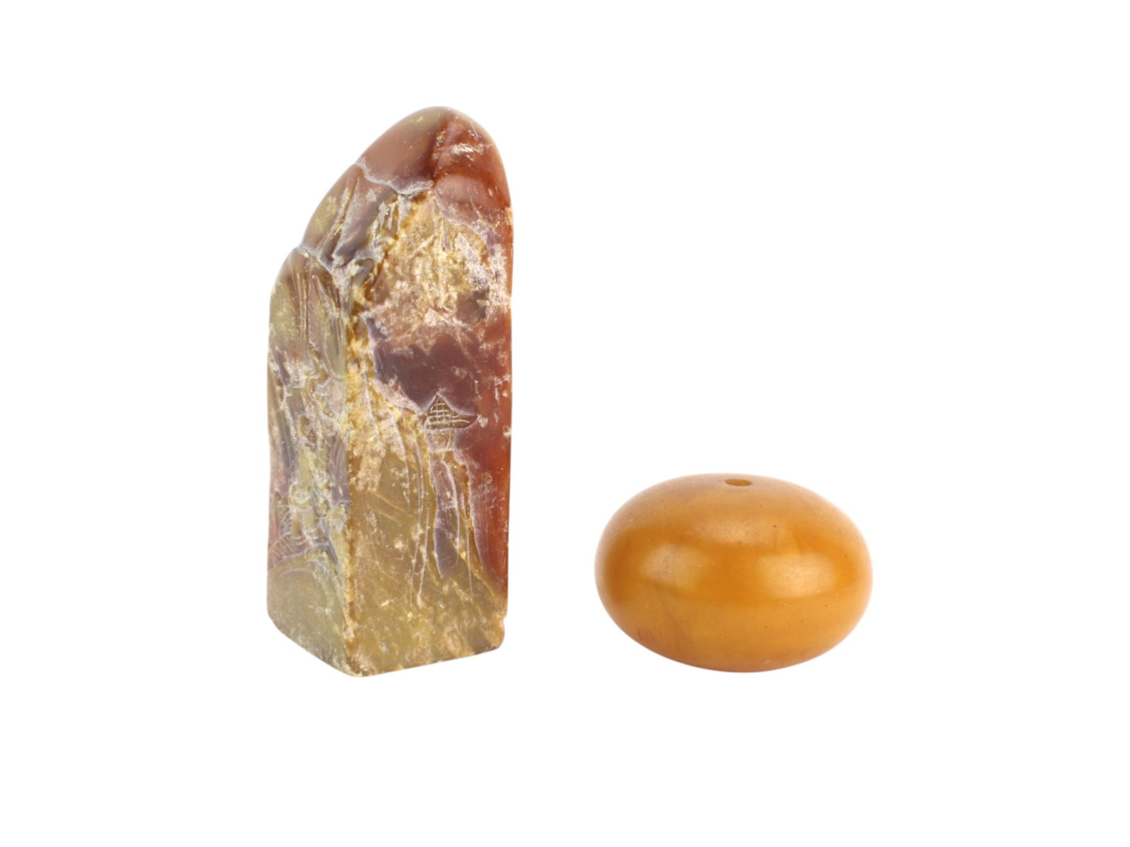 A Chinese Soapstone Seal & a Large Amber Bead: The seal measures 8.5 cm tall, and the bead measures 4.4 cm Diam..