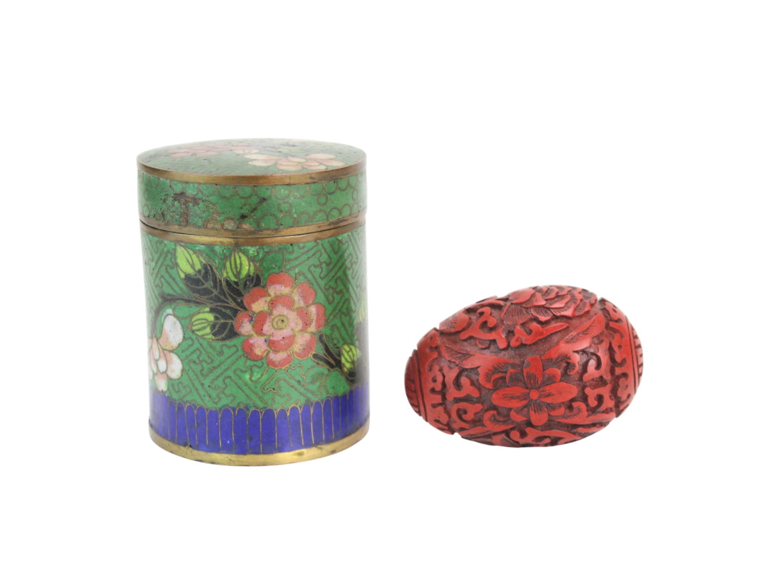 Cloisonne Tea Caddy & Cinnabar Carved Egg: Chinese Cloisonne Tea Caddy and Cinnabar Egg ? Floral enamel tea caddy with age patina and minor dents, paired with a carved cinnabar egg featuring floral and longevity motifs. Both show light wear fr