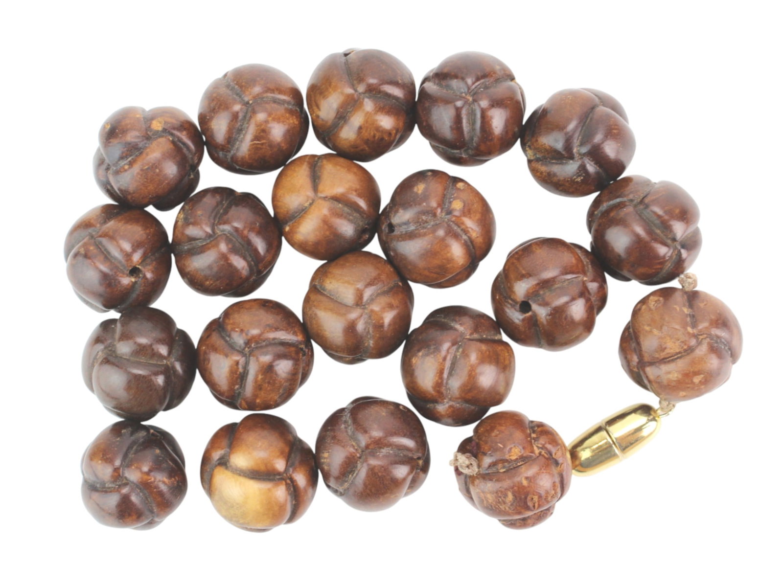 Lot of 20 Carved Wood Beads: Lot of 20 carved wooden beads with natural brown tones, light wear, and surface variations. Each bead measures approx. 23 mm in diameter.