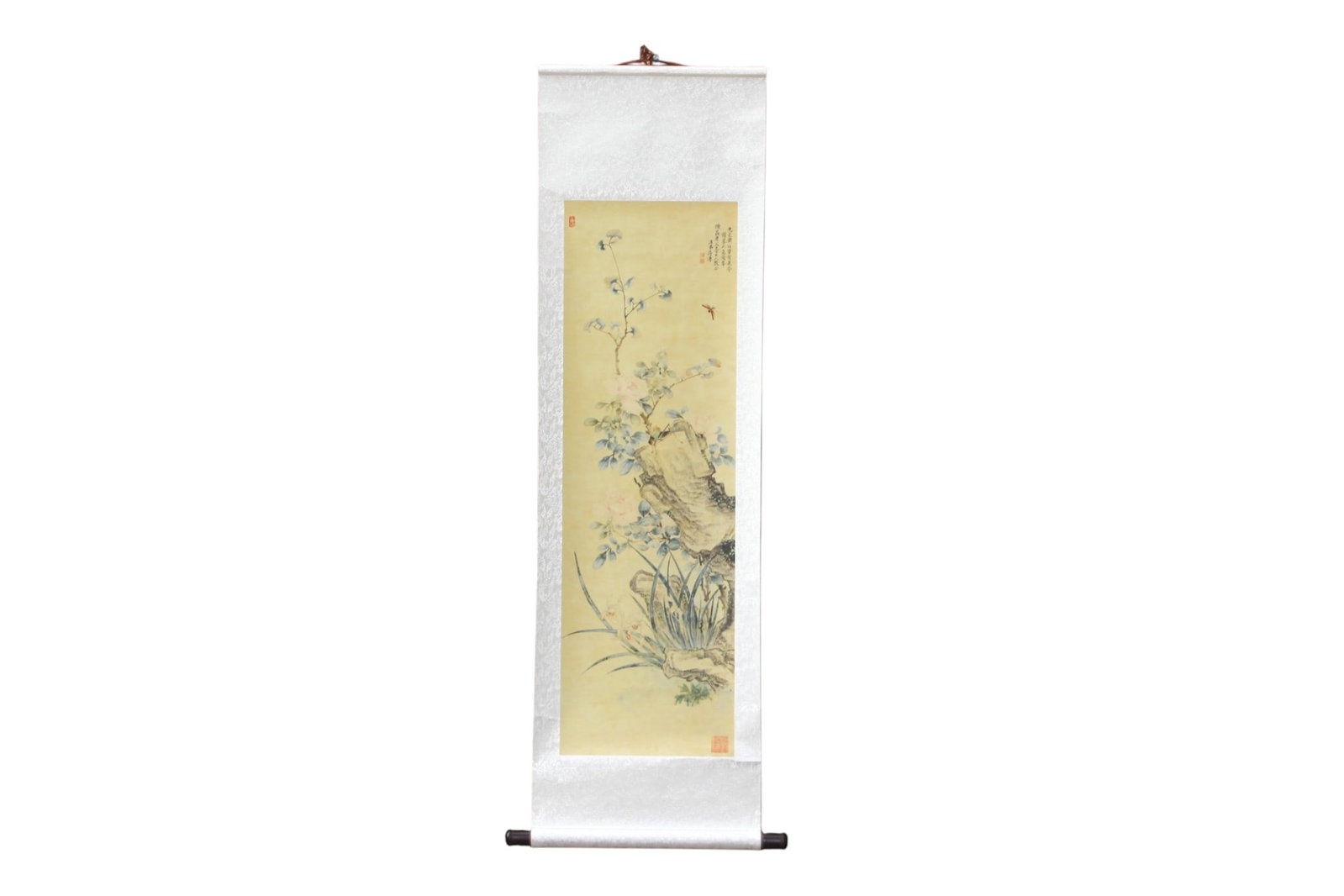 Chinese Floral Watercolor Print Scroll: Chinese watercolor-style print mounted as a hanging scroll, depicting flowering branches, garden rocks, foliage, insects, and orchids in delicate colors. Features calligraphic inscription and