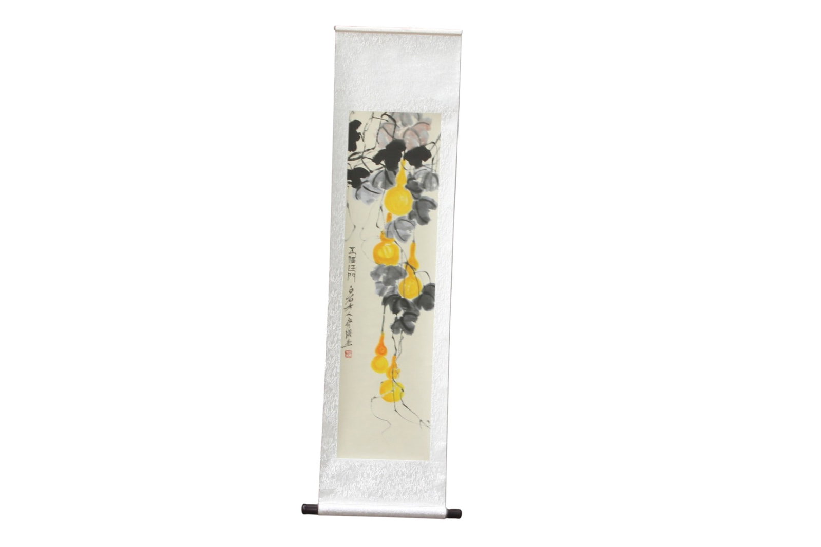 Chinese Gourd Scroll, After Qi Baishi: Chinese watercolor painting in the manner of Qi Baishi, depicting a vine of yellow-orange gourds with bold black and gray leaves, accompanied by calligraphic inscription and red seal mark. Mounted as
