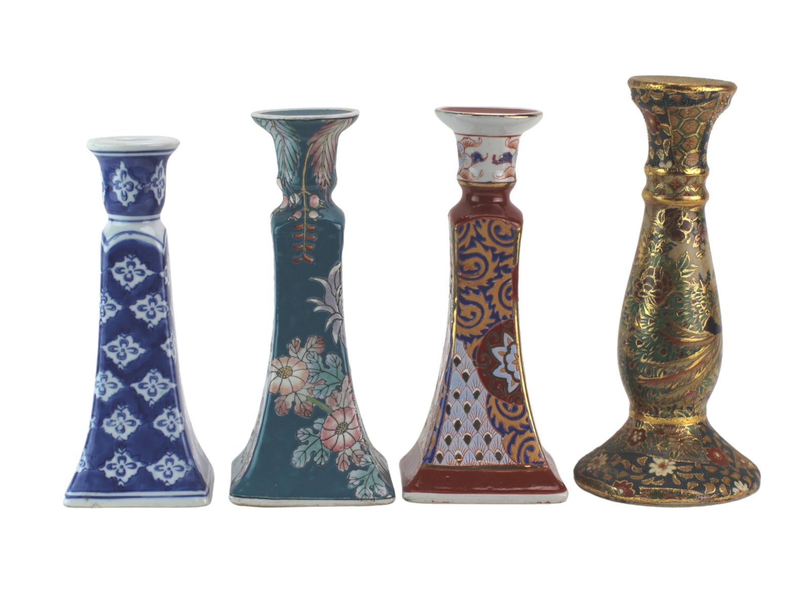 Four Asian Porcelain Candle Sticks: The largest one measures Approx. 9 1/4 in. tall.