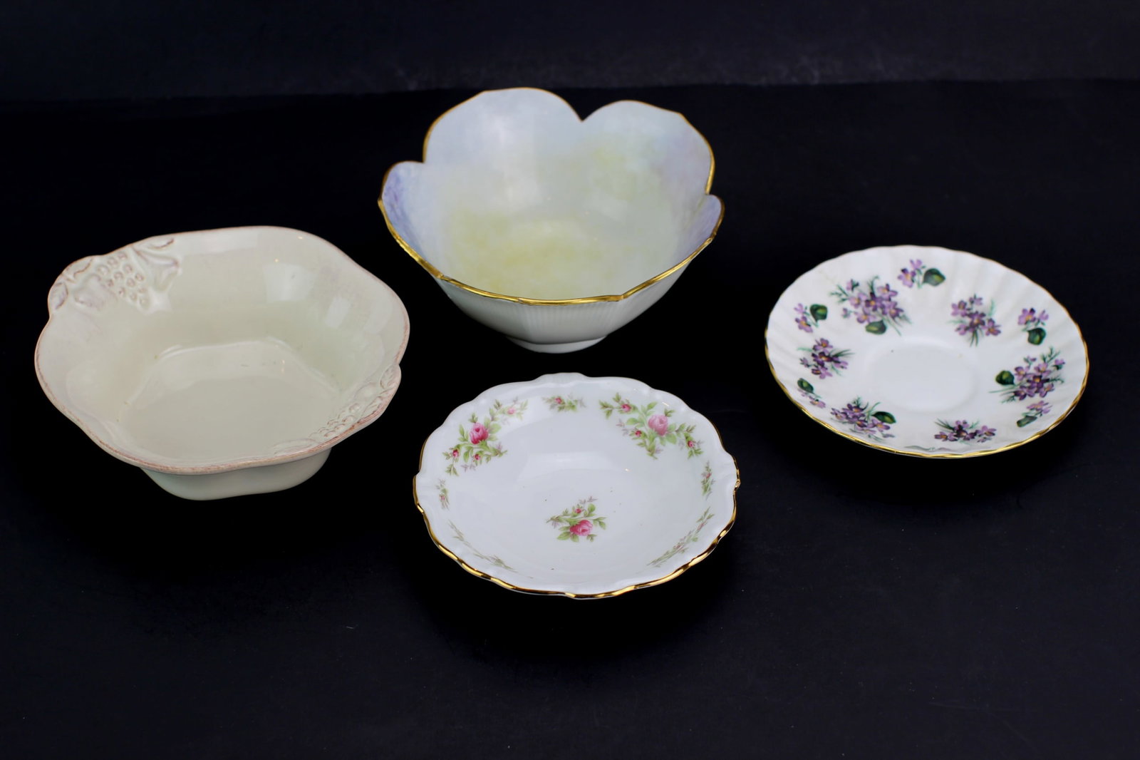 Four Porcelain Items: Includes two bowls and two dishes. 6 in. (D) X 2 3/4 in. (H); 6 1/2 in. (D) X 2 in. (H).